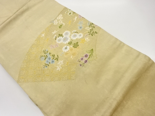 地紙に草花・七宝模様織出し名古屋帯